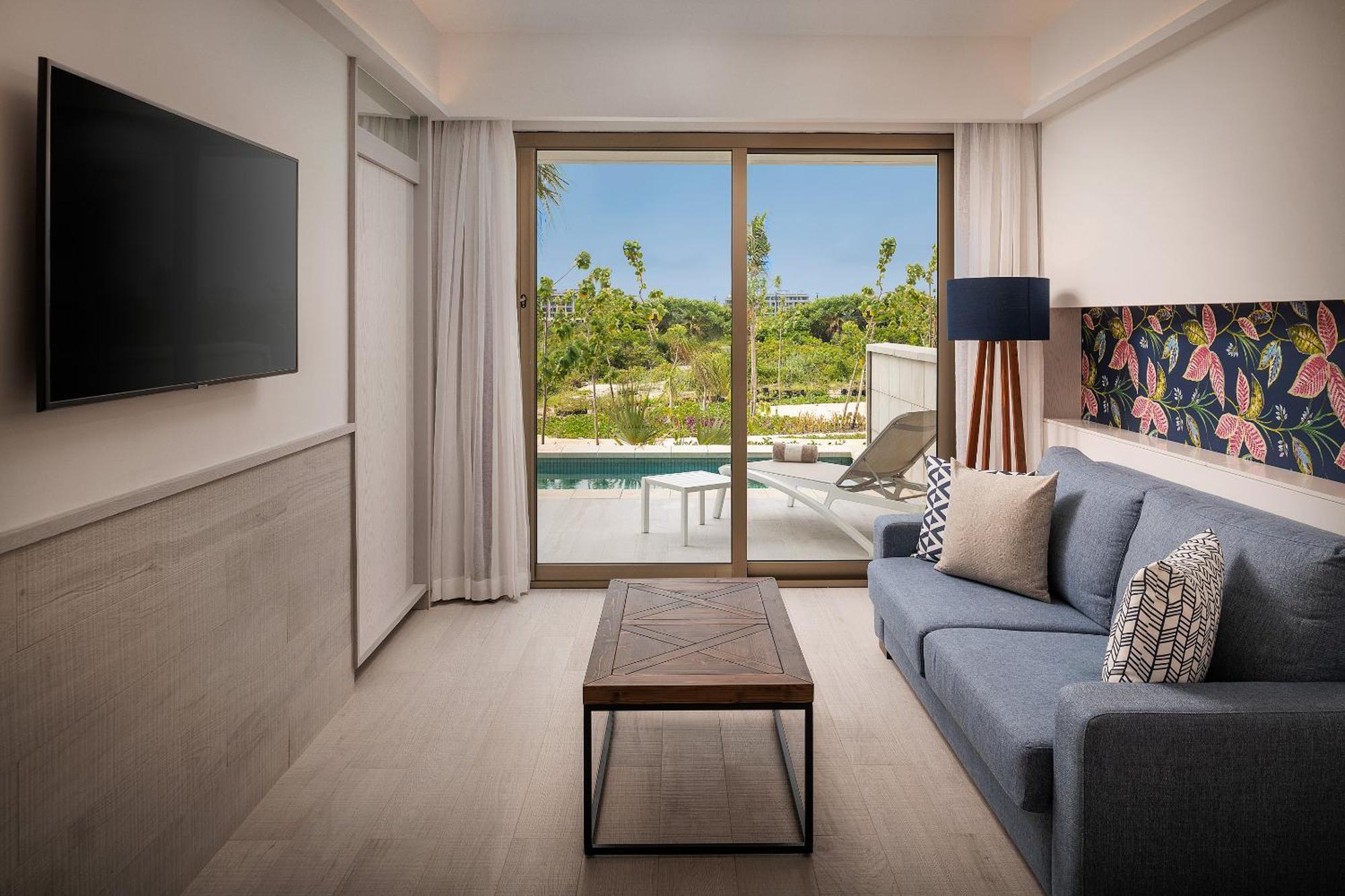 Catalonia Grand Costa Mujeres All Suites & Spa Cancún Exterior foto Living room of a suite at the Hilton Tulum Resort